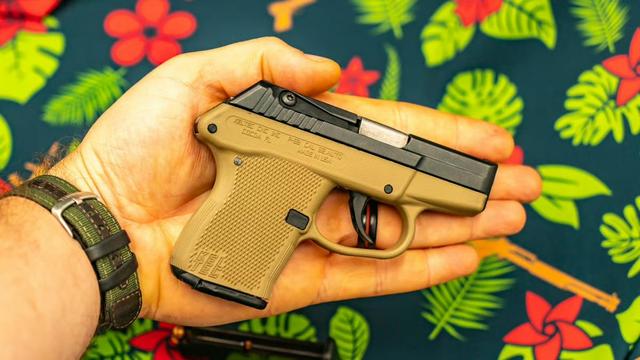 Keltec P32 being held in someone’s hand. The gun is very small.